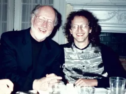 John Williams and Kenneth Lampl at a dinner in the 1990s. Photo: supplied
