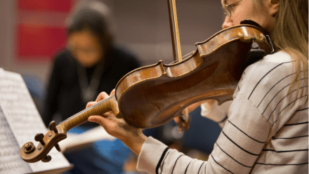 Students practice the violin during teaching sessions with  at the ANU School of Music (Lannon Harley/ANU).