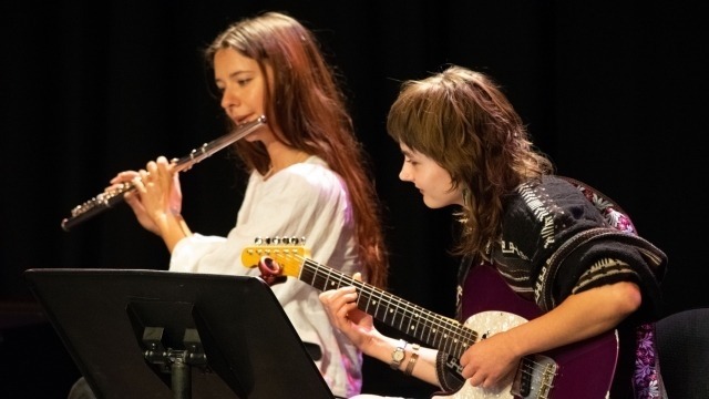 Image: ANU School of Music students Olivia Uebergang (guitar) and Mereki Leten (flute). Photo by Yun Hu