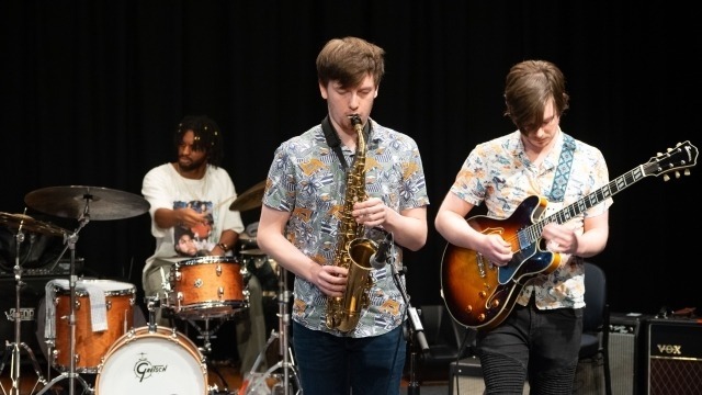 Image: Elisha Adisa (drums), George Butler (saxophone) and Cian Boesen (guitar) at the Friends of the School of Music Ensemble Prize 2024. Photo by Yun Hu.