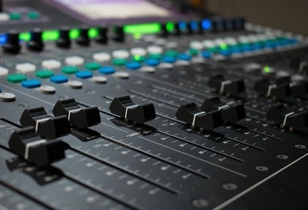sound engineers mixing desk